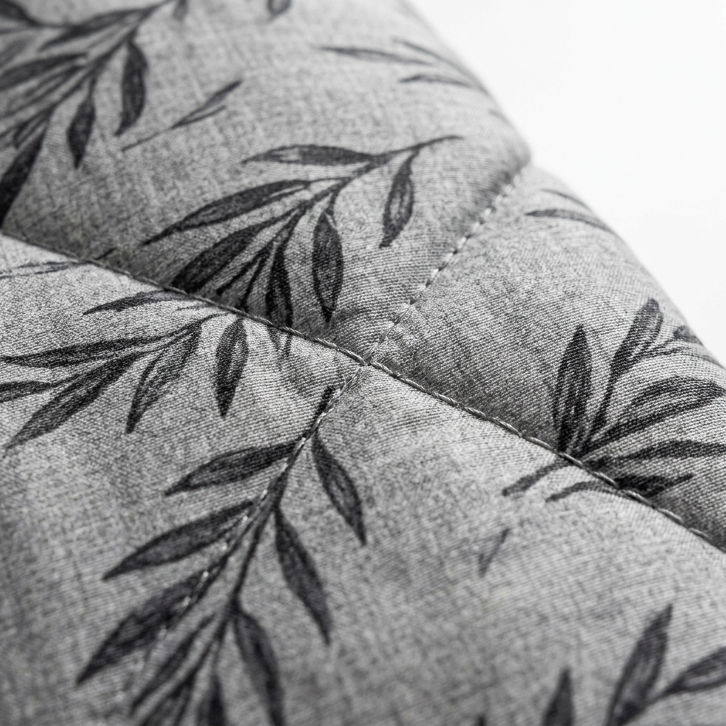 Zoom tissu feuillages gris